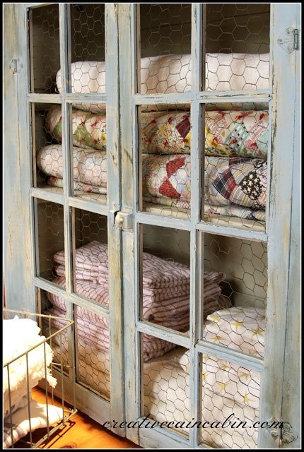 use nooks for storeage by placing hutches/open shelving on top of tables and securing to wall- gives illusion of built-in and maximizes storage in small spaces Blanket Armoire, Quilt Cabinet, Wire Doors, Hallway Vintage, Quilt Display, Vintage Cabinet, Quilt Storage, Cabinet Makeover, Linen Storage