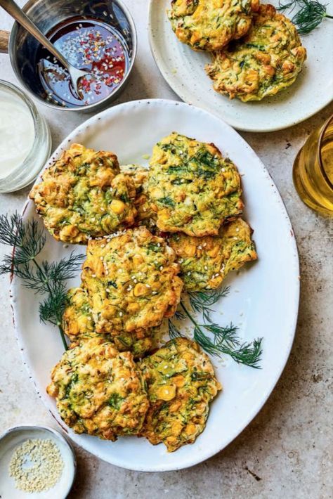 This recipe for air fried sweetcorn and courgette fritters is delicious at any time of day but we particularly love them for brunch. Using minimal oil, they're much healthier than typical fritters and happen to be vegan too. Sesame Sauce Recipe, Sweetcorn Fritters Recipe, Vegan Air Fryer Recipes, Courgette Recipes, Courgette Fritters, Potato And Pea Curry, Sweetcorn Fritters, Vegan Air Fryer, Courgette Fritter