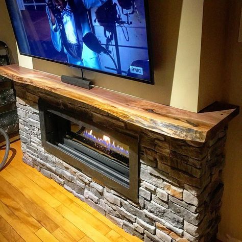 Custom live edge black walnut mantel for a client.  For this one we cut a larger slab so it wrapped around the fireplace.  We did a satin clear coat on the piece to accentuate the nice grain in the walnut. Diy Electric Fireplace Mantle, Rustic Wood Mantle, Cottage Muskoka, Live Edge Mantle, Live Edge Fireplace, Live Edge Fireplace Mantel, Walnut Mantel, Fireplace Mantle Shelf, Diy Electric Fireplace