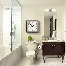 Contemporary Bathroom Remodel, Bathroom Tower, Shower Hardware, Eclectic Bathroom Design, Marble Bathroom Floor, Bathroom Clock, Beige Cabinets, Recessed Panel Cabinets, Beautiful Bathroom Designs