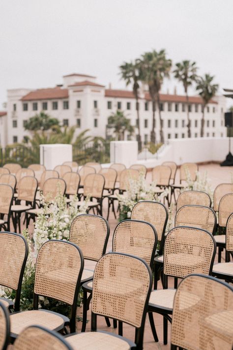 Santa Barbara Wedding, Wedding Planner, Hotel Californian, Outdoor wedding ceremony, black and white wedding, ceremony chair inspo, wedding ceremony flowers, ceremony flowers, white and green wedding flowers, summer wedding, wedding venue, wedding photography, seating chart, wedding stationary, menu cards, unique wedding ideas, wedding day inspo, wedding idea, floral arrangements, center pieces, tablescape, reception inspo, wedding reception inspo, wedding decor inspo Rattan Wedding Chairs, Hotel Californian Santa Barbara Wedding, Rattan Chair Wedding, Black Chairs Wedding Reception, Black Chair Wedding, Black Chairs Wedding, Bistro Chairs Wedding, Black Wedding Chairs, Ikea Tarno