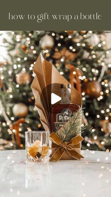 Sierra | Food, Drink + Travel Blogger on Instagram: "How to gift wrap a bottle 🎁  Give the gift of @stelmococktails this holiday season and wrap it in this fun + unique way! Their new Barrel Aged Old Fashioned is delicious and so simple to make, which makes it perfect for all your upcoming holiday parties and a great gift idea. This limited release St. Elmo Barrel Aged Old Fashioned is available now in Indiana grocery + liquor stores. #StElmoPartner   #christmasgifts #christmasgiftideas #christmasgiftideas #giftwrapping #giftwrap #wrappingpaper #holidays #holidayseason #happyholidays #holidaydecor #christmasdiy #diy #giftideas #christmascrafts #craftideas #crafting crafts, crafting, gift wrapping, wrapping presents, Christmas" Wrapping A Liquor Bottle Gift Ideas, How To Wrap Alcohol Gift, Alcohol Bottle Wrapping Ideas, Cute Alcohol Gift Ideas, Gifting Liquor Ideas, Gift Wrap A Bottle Of Alcohol, Wrapping Whiskey Bottle, Liquor Bottle Wrapping Ideas, Mini Prosecco Bottles Gift