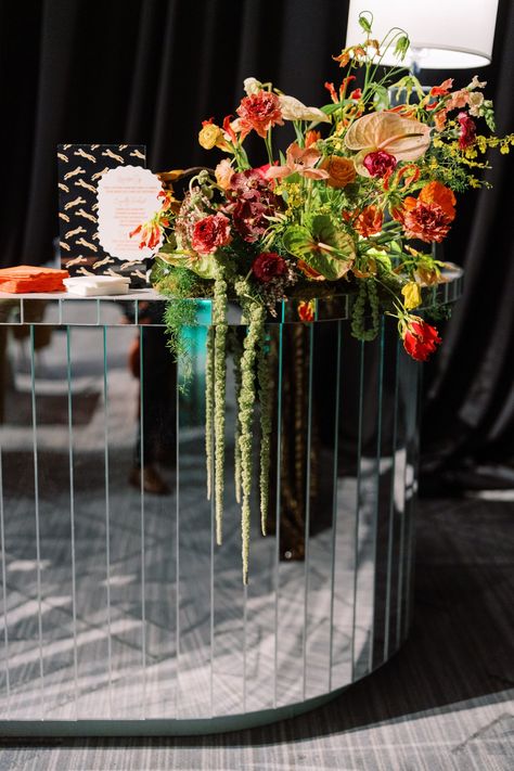 Vibrant bar florals for planner event at the Four Seasons Nashville. Unique and fun florals in bright colors. Floral colors in chartreuse, red, magenta, yellow, blush, and peach. Colorful floral design with orchids, poppies, tropical flowers, and amaranthus. Funky event design with tropical florals and leopard print accents. Design by Rosemary & Finch Floral Design in Nashville, TN. Wedding Bar Floral Arrangements, Bar Florals, Bar Flowers, Flowers Chandelier, Tropical Wedding Reception, Yellow Blush, Gucci Garden, Funky Wedding, Event Florals