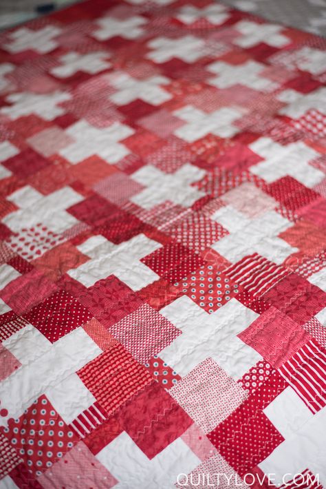 Quilty Love | Red Scrappy Swiss Plus Quilt | http://www.quiltylove.com Quilty Love, Granny Square Quilt, Walking Foot Quilting, Plus Quilt, Two Color Quilts, Perfect Binding, Cross Quilt, White Quilts, Red And White Quilts