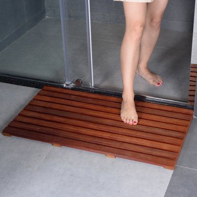 Oversized Design Shower Mat in Bathroom is Perfect For Large Spaces The teak shower mat can be used as standalone stepping mats, for spa shower floor, for door mats and use in a Hotel room Inside The Shower or on The Bathroom Floor ect. Crafted from teak wood and comes in an oiled finish, which is native to Indonesia and often used in upscale resorts, it gives your ensemble a splash of spa-worthy style. Its surface is subtly groove and feet are padded with 8 round shape pad for added stability. Wood Bath Mats, Teak Shower Mat, Teak Bathmat, Teak Bath, Non Slip Shower Mat, Wood Bath, Natural Teak Wood, Spa Shower, Linen Cabinet