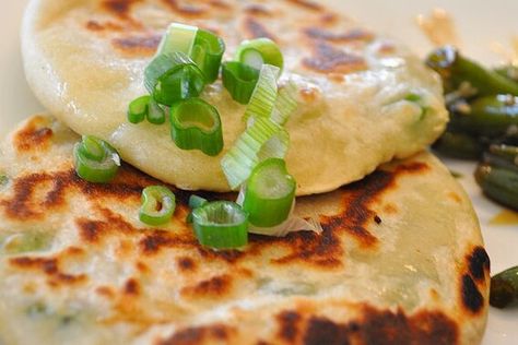 Green Onion Cakes Recipe | Allrecipes Green Onion Cakes, Onion Cake, Green Onion Pancake, Onion Pancake, Chinese Dinner, Healthy Homemade Snacks, Honey Sesame Chicken, Chinese Foods, Kitchen Fun