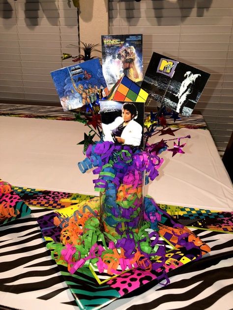 90s Birthday Party Theme Centerpieces, Dancing Through The Decades Centerpieces, Quiz Night Table Decorations, Dance Party Centerpieces, 80s Birthday Centerpieces, 90's Theme Centerpieces Party Ideas, Early 2000s Centerpieces, 90s Themed Centerpieces, 1980s Party Centerpiece