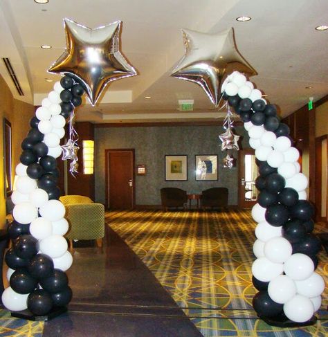 shooting star balloon column: #shootingstars #balloon #columns #arch #balloons #balloondecor #balloonarch #white #black #silver #star Star Balloon Column, Balloon Towers Ideas, Shoot For The Stars Graduation Theme, Night To Shine Decorations, Star Balloon Centerpieces, Star Graduation Theme, Star Balloon Arch, Ballon Column, Class Reunion Decorations