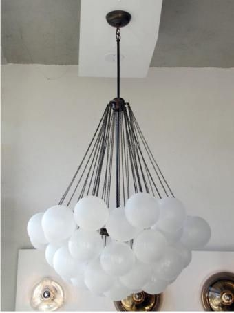 Balloon chandelier: Remodelista Cloud Chandelier, Balloon Chandelier, Balloon Ceiling, Frosting Techniques, Balloon Art, The Ceiling, Ceiling Decor, Party Balloons, Balloon Decorations