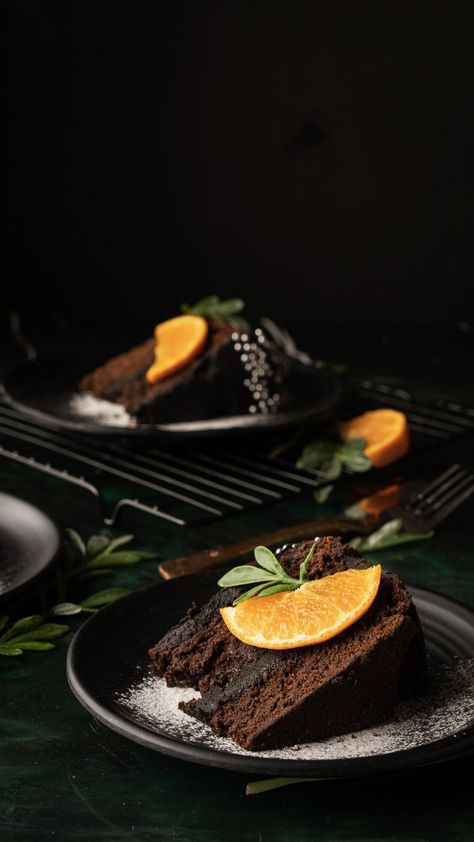 Dark chocolate cake with chocolate ganache decorated with fresh orange. Cake Photography Styling, Chocolate Cake Images, Advertising Ideas Marketing, Food Photography Dessert, Eggless Chocolate Cake, Food Photography Composition, Moody Food Photography, Orange Chocolate Cake, Food Photography Tutorial