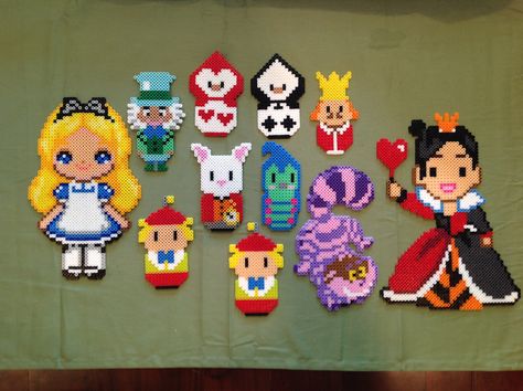 These Alice In Wonderland Perler figures were so much fun to make :) - by Reyna send Maria Perler Bead People, Pearl Beads Pattern Disney, Perler Bead Patterns Disney, Mad Hatter Perler Beads, Perler Alice In Wonderland, Alice In Wonderland Perler Bead Patterns, Alice In Wonderland Perler Beads, Disney Castle Perler Beads, Alice In Wonderland Hama Beads