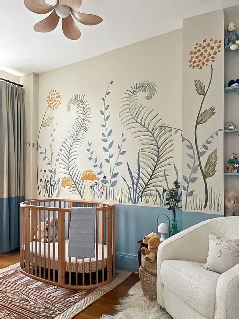 From stripes to a floral wall mural, here are 7 ways to design a blue nursery that stand out from the rest. Baby Nursery Murals, Apartment 2023, Oval Crib, Fine Paints Of Europe, Nursery Interior, West Elm Kids, Nursery Mural, Unisex Nursery, Baby Room Inspiration