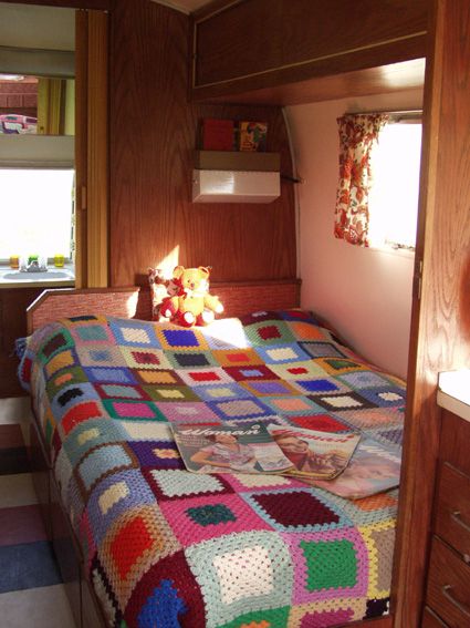 Crocheted afghan adds vintage flair. Retro Caravan Interiors, Retro Caravans, Caravan Interiors, Vintage Caravan Interiors, Chalk Talk, Retro Caravan, Trailer Interior, Caravan Interior, Vintage Caravan