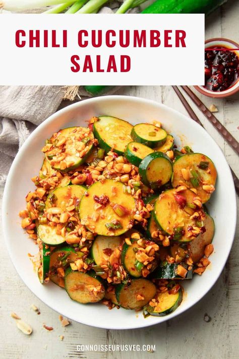 This Asian-inspired chili cucumber salad will be your new favorite summer side dish! It's made with crispy cucumber slices and crunchy peanuts in a kicky sesame dressing. Cucumber Peanut Butter Salad, Peanut Butter Cucumber Salad, Chili Cucumber Salad, Crispy Cucumber, Edamame Recipes Salad, Peanut Butter Salad, Chili Salad, Chili Crunch, Simple Salads