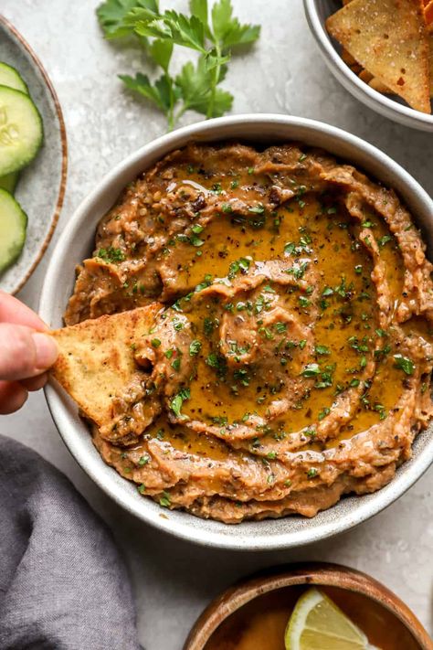 This Roasted Eggplant Dip is the perfect healthy appetizer! It's made with a savory blend of roasted eggplant, tomato, onion, and garlic blended until creamy, then finished with a squeeze of lemon. Serve with homemade crackers or fresh veggies! Tomato Dip Recipes, Eggplant Dip Recipes, Eggplant Appetizer, Roasted Eggplant Dip, Healthy Eggplant, Healthy Appetizer, Eggplant Dip, Roasted Eggplant, Homemade Crackers