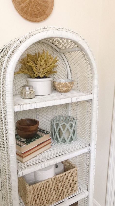 Rattan Shelf Styling Bathroom, How To Style Rattan Shelves, White Wicker Bookshelf, Wicker Bathroom Shelf, White Wicker Shelf, Painted Wicker Shelf, Wicker Bookshelf Styling, Coastal Bathroom Shelves, Bathroom Wicker Storage