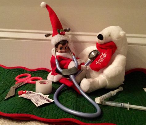 Elf on a shelf Nurse! Elf On Shelf Nurse Ideas, Elf On The Shelf Ideas Vet Clinic, Elf On The Shelf Hospital Ideas Funny, Firefighter Elf On The Shelf, Work Elf On The Shelf, Nursing Elf On The Shelf Ideas, Vet Clinic Christmas Decor, Elf On The Shelf Vet Clinic, Hospital Elf On The Shelf Ideas