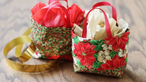 Easy DIY Gift Bags | AllPeopleQuilt.com Happy Holiday Gifts, American Patchwork And Quilting, Thread Catcher, Gift Bags Diy, Tiny Treats, Holiday Gift Bag, Easy Diy Gifts, Paper Gift Bags, Christmas Gift Bags