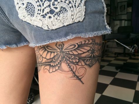 Dotwork garter and dragonfly tattoo done by natasha papadakos @ living art collective