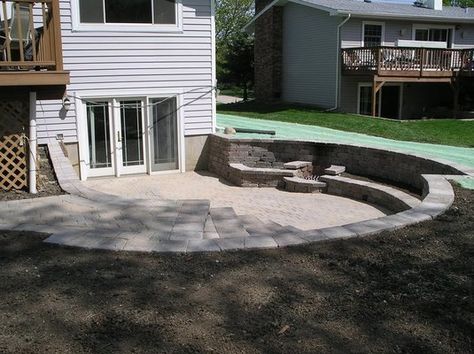 Sunken patio with built in fire pit. | Yelp Sunken Patio Ideas Retaining Walls, Basement Walkout Ideas Retaining Walls, Walkout Basement With Retaining Wall, Walkout Basement Patio With Hot Tub, Walkout Basement Patio Retaining Wall, Walkout Basement Patio, Retaining Wall Patio, Backyard Spa, Sunken Patio