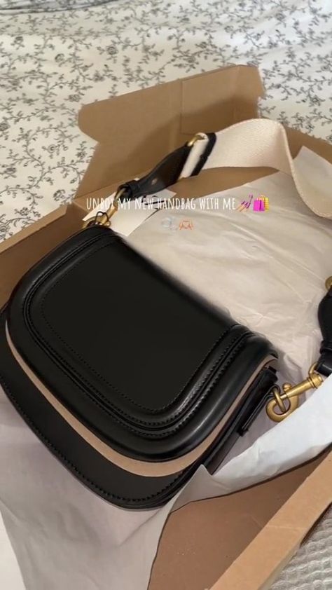 ZARA fans are in a frenzy over a stunning black handbag with a major perk. The retailer has released a gorgeous little black handbag for every occasion, which comes with one special feature. Taking to TikTok, user Eilis Marron shared a short video to the platform showing off the new find. The caption on the […] Cross Over Bag, Bag Zara, Zara Bags, Black Handbag, Go Wild, Going On Holiday, New Handbags, Cotton Bag, Black Handbags