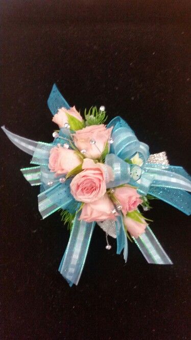 Pink roses with aqua blue Pink And Blue Prom Flowers, Turquoise Corsage, Corsage Prom Turquoise, Teal And Pink Corsage, Turquoise Roses, Corsage Prom, Prom Flowers, 90th Birthday, Aqua Blue