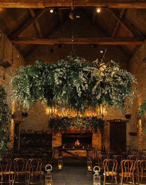 Foliage Chandelier Wedding, Hanging Wedding Greenery, Earthy Floral Wedding, Wedding With Lots Of Greenery, Hanging Foliage Wedding, Rustic Modern Wedding Venues, Dark Earthy Wedding, Greenhouse Wedding Decor, Indoor Wedding Venue Ideas