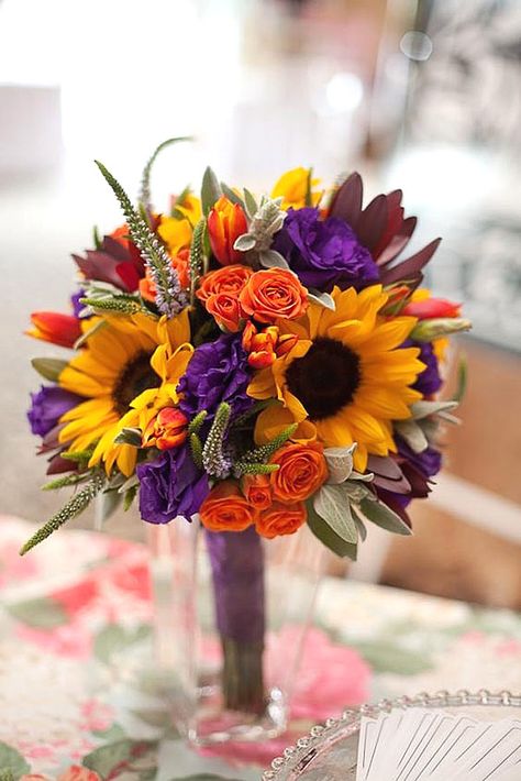 Brilliant Sunflower Wedding Bouquets For Happy Wedding ❤ See more: http://www.weddingforward.com/sunflower-wedding-bouquets/ #weddings Sunflower Wedding Centerpieces, Purple Centerpieces, Wedding Flowers Sunflowers, Fall Purple, Orange Bouquets, Orange Wedding Flowers, Sunflower Wedding Bouquet, Carnival Wedding, Yellow Bouquets