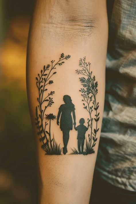 25+ Mother and Son Tattoo Ideas To Celebrate Your Special Bond Mom And Son Walking Tattoo, Mother Silhouette Tattoo, Mother And Son Tattoo Ideas Unique, Mom And Son Tattoo Ideas Simple, Silouette Tattoo, Mom Tattoo Designs For Son, Boy Mom Tattoo, Motherhood Tattoo, Mother And Son Tattoo Ideas