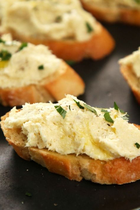 Looking for quick and easy appetizers? Make this creamy salt cod spread with crostini. Use cod, lemon, parsley, and baguette bread to bake this seafood appetizer. #appetizers #appetizerrecipes #appetizerideas #apps #entertaining #seafood #seafoodrecipes #seafooddishes #recipes White Fish Appetizers, Cod Appetizer Recipes, Crostini Recipe, Toasted Crostini, Crostini Appetizers, Chewy Bread, Fish Ideas, Baguette Bread, Crostini Recipes