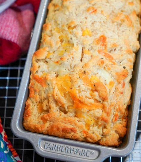 3 ingredient beer bread recipe! Add cheddar cheese and chiles to make it out of this world! Served as a side dish for dinner or as an appetizer with dip it's a real winner with everyone, even those who aren't fans of beer.