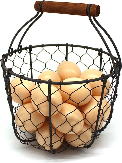 CVHOMEDECO. Round Chicken Wire Egg Basket Fruit Basket with Wooden Handle Primitives Vintage Gathering Basket. Rusty Century Egg, Easter Table Centerpieces, Wire Egg Basket, Gathering Basket, Basket Fruit, Farmhouse Easter, Kitchen Baskets, Table Centrepiece, Egg Basket