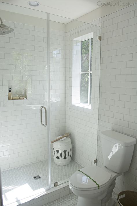 The Southern Living Idea House 2017 is located on Bald Head Island NC with inspiration from the surroundings, eye-catching colors and an open floor plan. White Marble Subway Tile Bathroom, Penny Tile And Marble Bathroom, Penny Tile Bathroom, Penny Tiles Bathroom, White Subway Tile Shower, White Subway Tile Bathroom, Southern Living Idea House, Marble Bathtub, Subway Tile Showers