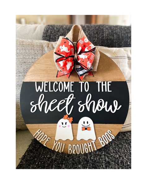 Welcome to the sheet show- hope you brought boos! DETAILS: -18' round and 1/2 inch thickness. -Laser cut wood lettering painted white. -Bow to match attached.  -High quality burlap attached to back for easy hanging. ** Although we do seal each sign for protection, it is not recommended to leave on uncovered porch for long periods of time. Welcome To The Sheet Show Door Hanger, Fall Wood Door Sign, Welcome To The Sheet Show, Amazon Door Hanger, Hocus Pocus Porch Leaner, Fall Door Rounds, Cricut Front Door Signs, Funny Halloween Door Signs, Halloween Door Signs Front Porches