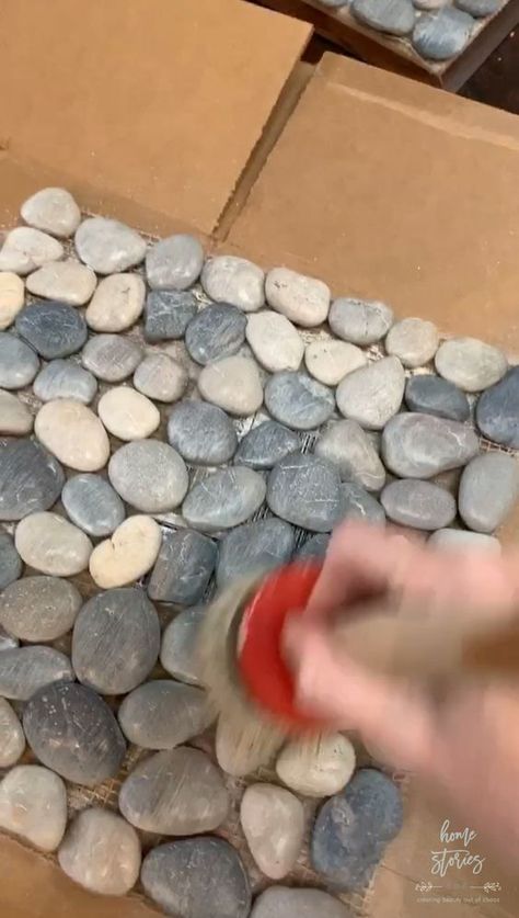 Fireplace Makeover { How to Tile Over Existing Tile Tutorial } | Home Stories A to Z Whitewash Tile Fireplace, Pebble Stone Fireplace, Stone Over Tile Fireplace, Stone Tile Fireplace Ideas, Fireplace Floor Tile, Pebble Fireplace, Fireplace Facelift, Tile Around Fireplace, Tile Over Tile