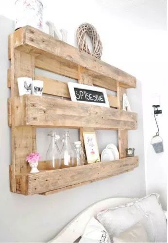 No messy difficult disassembly of the pallet! This wall shelf uses a mostly-intact pallet. Whew! Source Unknown featured on Remodelaholic. #Remodelaholic #palletprojects #palletwallshelf #whattobuildwithapallet #pallet