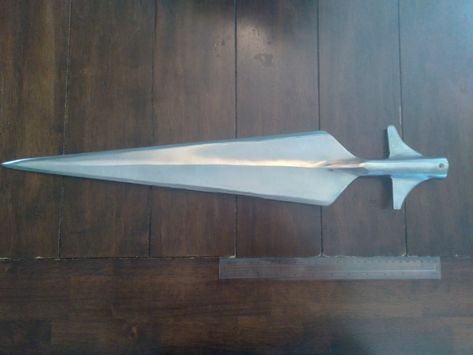 A blade large enough to use both thrusting and slashing attacks. Similar to a greatspear from Elden Ring. For sale at a very good price at Kult of Athena https://www.kultofathena.com/product/large-winged-spearhead/ Winged Spear, Spear Head, Elden Ring, Ring, For Sale