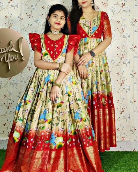 *Prices kids :- 999/- free shipping* *14 to 38 size* *M,L,XL,XXL prices 999 free shipping *3XL to 5XL* *1050 free shipping 🪂💃🏻 kids gown💃🏻🪂 💃🏻 **Beautifully Customized Long Frocks for Mom and daughter Comboo* 💃🏻 🌹 *Fabric : *Soft Dola santoon silk fabric with traditional border* 🌹 *Yoke part designed with lace border .* *Boutique Finishing* 👌🏻 **Sizes* :👇 *👍🏻lining attached* *Mom Sizes* 👇👇 *Dupatta - no* (Customization Available for all sizes) *1-2 Dola Silk Long Frocks, Traditional Frocks For Kids, Kalamkari Dresses For Kids, Traditional Long Frocks, Long Frock Designs For Kids, Baby Long Frocks Designs, Mom And Daughter Dresses Indian, Kids Long Frocks Design, Long Frocks Indian Designer Dresses