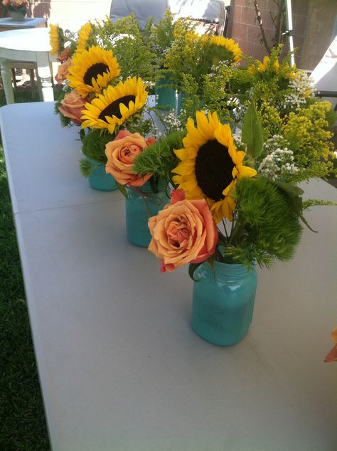 Turquoise mason jar with sunflower and peach rose. Wedding Flowers Coral, Salmon Wedding, Sunflower Weddings, Mason Jars Ideas, Jars Ideas, Coral Wedding Flowers, Sunflower Wedding Decorations, Sunflower Centerpieces, Samantha Wedding