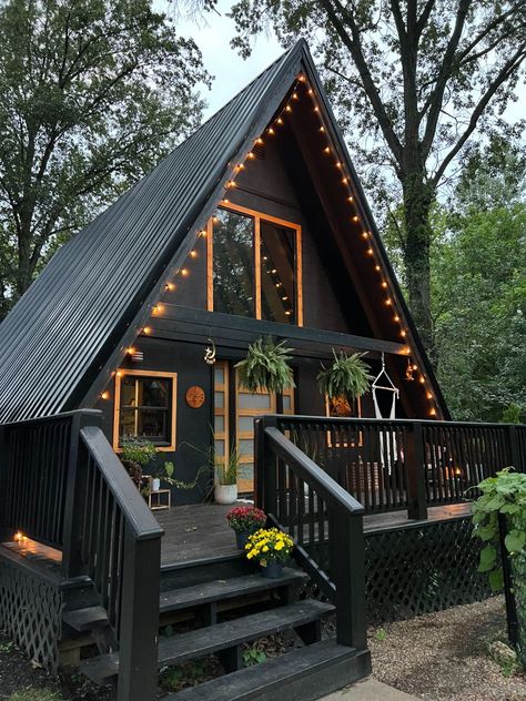 She Went From Life as a Nomad to an A-frame Cabin A Frame Cabin Stairs, A Frame With Porch, A Frame House With Garage Underneath, A Frame House Colors Exterior, A Frame Metal Roof, A Frame Shed Diy, Diy Tiny A Frame Cabin, Aframe Home Designs, A Framed Houses