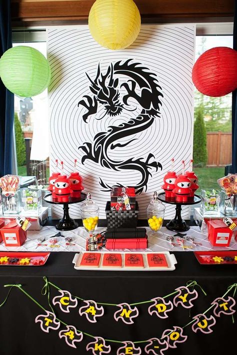 A Lego Ninjago Inspired Birthday Party | CatchMyParty.com Ninjago Birthday Party Ideas, Birthday Party Candy Table, Lego Ninjago Birthday Party, Birthday Ninjago, Ninja Themed Birthday Party, Candy Table Decorations, Karate Party, Lego Ninjago Party, Lego Ninjago Birthday