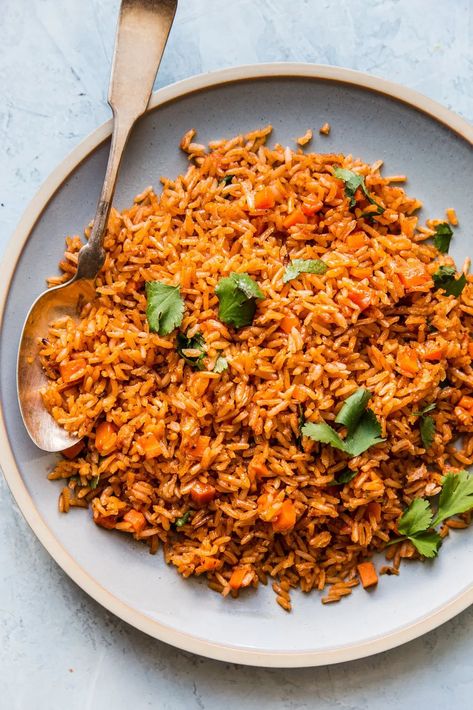 This savory, tomato-tinged, restaurant-style Mexican rice recipe could not be easier, and makes a killer side dish (just add beans!) or burrito filling. Homemade Mexican Rice, Burrito Filling, Mexican Rice Recipe, Mexican Rice Recipes, Restaurant Inspired Recipes, The Modern Proper, Modern Proper, Vegetarian Mexican, Savory Rice