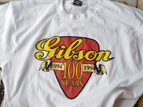 Hey, I found this really awesome Etsy listing at https://www.etsy.com/listing/722538509/90s-gibson-guitar-tshirt-anniversary-100 Anniversary Tshirt, Shirt Outfit Ideas, Gibson Guitar, Gibson Custom Shop, Les Paul Custom, Its A Mans World, Gibson Guitars, Fall Shorts, Jordan 2