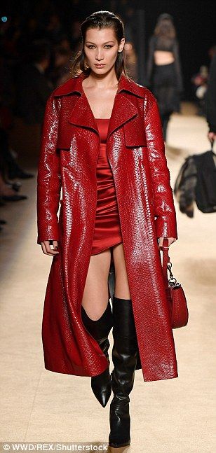 Red-y to go! Bella Hadid looked sensational in a striking satin mini dress teamed with a p... Trench Coat Runway, Crocodile Outfit, 2025 Predictions, Red Trench Coat Outfit, Bella Hadid Looks, Patent Trench Coats, Crocodile Fashion, Colour Mood, Trench Outfit