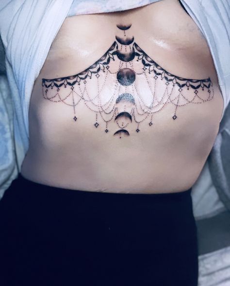 Viking Chest Tattoo Female, Witchy Underboob Tattoo, Middle Of The Chest Tattoo Women, Gothic Underboob Tattoo, Gothic Sternum Tattoo, Sternum Underboob Tattoo, Witchy Chest Tattoo, Witchy Sternum Tattoo, Witchy Tattoos