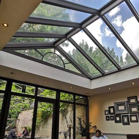 Roof Skylight Designs ✨️ #roof #skylight #rooftop #rooftoptentliving #homedesignsdworld #explorepost #explorepage Glass Atrium Architecture, Sky Roof Ceilings, Courtyard Glass Roof, Atrium Courtyard, Glass Roof Extension, Modern Skylights, Skylight Glass, Roof Skylight, Skylight Design