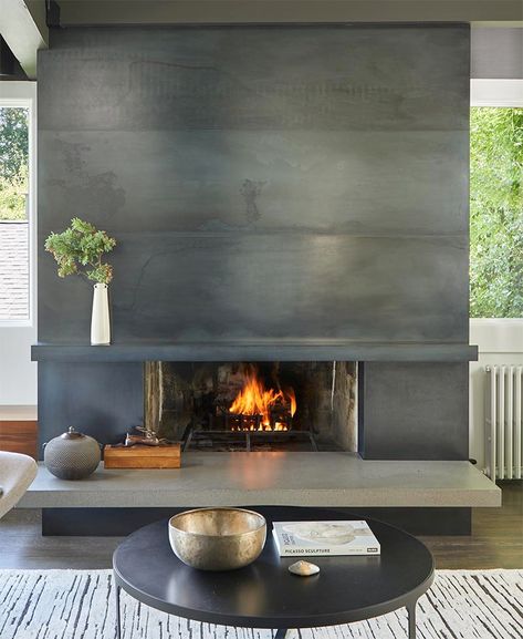 A Blackened Steel Fireplace Surround With A Concrete Hearth Is A Strong Look Inside This Mid-Century Modern House Fireplace Modern Design, Contemporary Fireplace Designs, Steel Fireplace, Hanging Fireplace, Metal Fireplace, Masonry Fireplace, Black Fireplace, Concrete Fireplace, Custom Fireplace