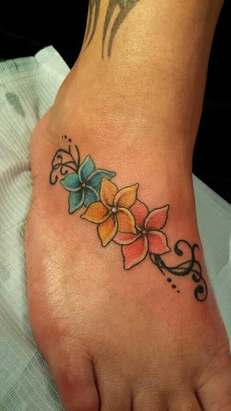 Colorful Ankle Tattoos For Women, Plumeria Tatoos, Granddaughter Tattoos, Y2k Tats, Tattoos For Women Elegant, Chest Tattoo Flowers, Mama Tattoos, Mommy Daughter Tattoos, Hawaiian Flower Tattoos