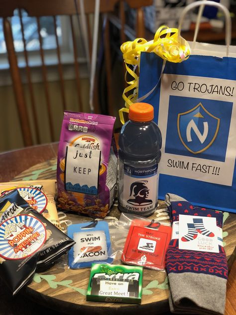 Swim goodie bag for State Championship Meet State Championship Goodie Bags, Gifts For Swimmers Diy, Swim Team Gifts Treats, Swim Goodie Bags, Swim Buddy Gift Ideas, Swim Team Gift Bags, Swim Team Goodie Bags, Swim Meet Bag Essentials, State Swim Meet Gifts