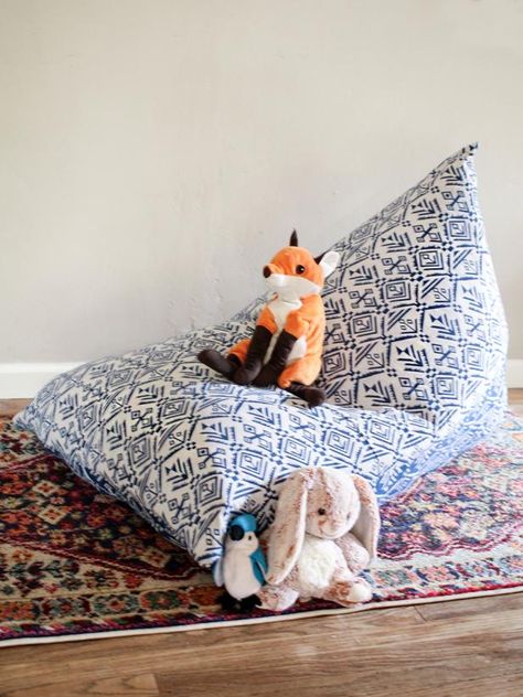 How to Make a Kid's Bean Bag Chair Using Stuffed Animals | HGTV Stuffed Animal Bean Bag Chair Diy, Stuffed Animal Storage Bean Bag Chairs, Living Room Toy Box, Stuffed Animal Chair, Make A Bean Bag Chair, Stuffed Animal Bag, How To Make A Bean Bag, Diy Bean Bag Chair, Living Room Toy Storage